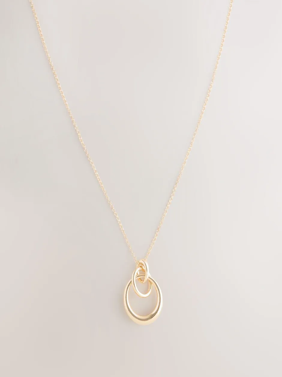 Sieraden|Next - Ketting met hangertje van vereende ringen Goudkleurig
