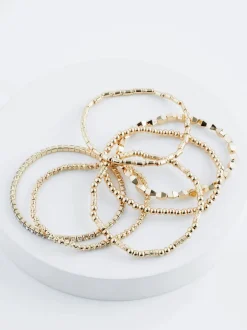 Sieraden|Gelegenheidskleding*Next - Set van glinsterende rekbare armbanden Goudkleurig