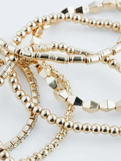 Sieraden|Gelegenheidskleding*Next - Set van glinsterende rekbare armbanden Goudkleurig
