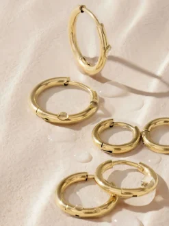 Sieraden*Next - Stainless Steel Graduated Huggie Hoop Earrings 3 Pack Goudkleurig