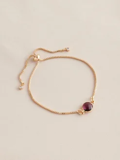 Sieraden|Next Goudkleurig - Trekarmband met geboortesteen