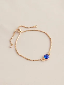 Sieraden|Next Goudkleurig - Trekarmband met geboortesteen