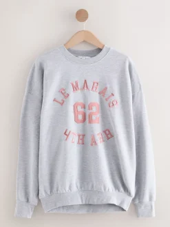 Hoody's En Sweatshirts*Next Grijs - Grafisch satijnapplicatie 'Le Marais' City sweatshirt met lange mouwen en ronde hals