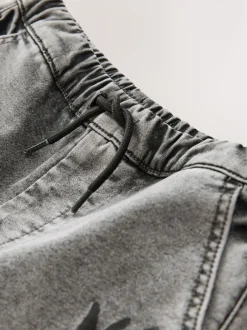 Jeans*Next - Cargo jeans met elastische taille (3-16 jr) Grijs met graffiti
