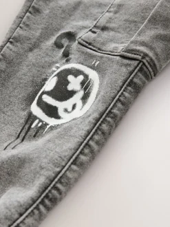 Jeans*Next - Cargo jeans met elastische taille (3-16 jr) Grijs met graffiti