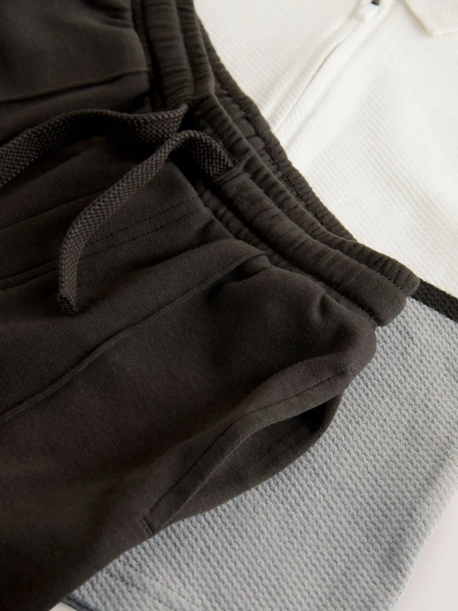 Tops|Joggingbroeken|Next - Set van poloshirt met lange mouwen en joggingbroek (3mnd-7jr) Grijs/witte rits