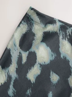 Rokken*Next - Satijnen midirok Groen met dierenprint