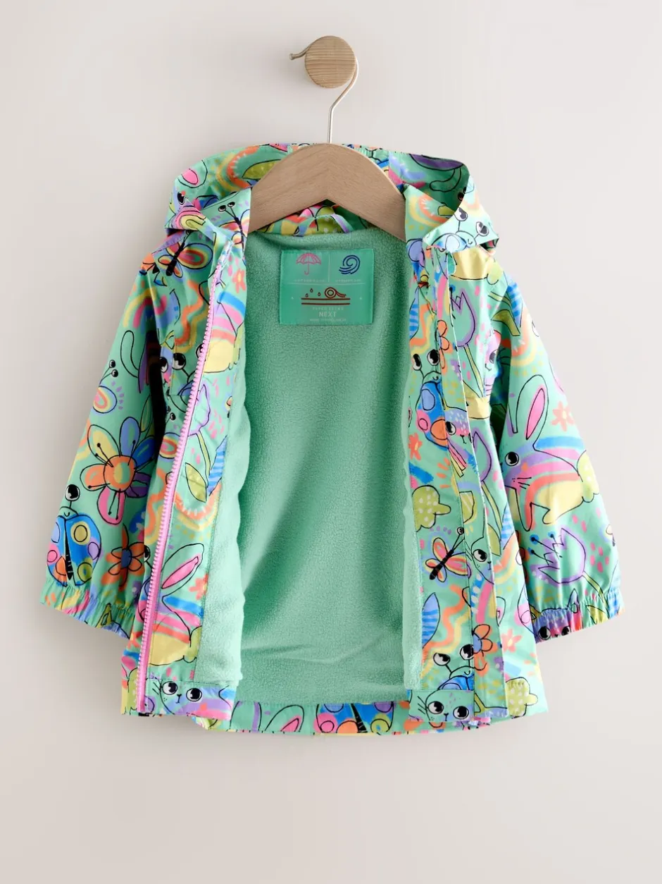 Jassen, Jacks En Kinderwagenpakjes|Jassen En Jacks|Next - Waterdicht jack met capuchon (6mnd -7jr) Groen met figuurtjes