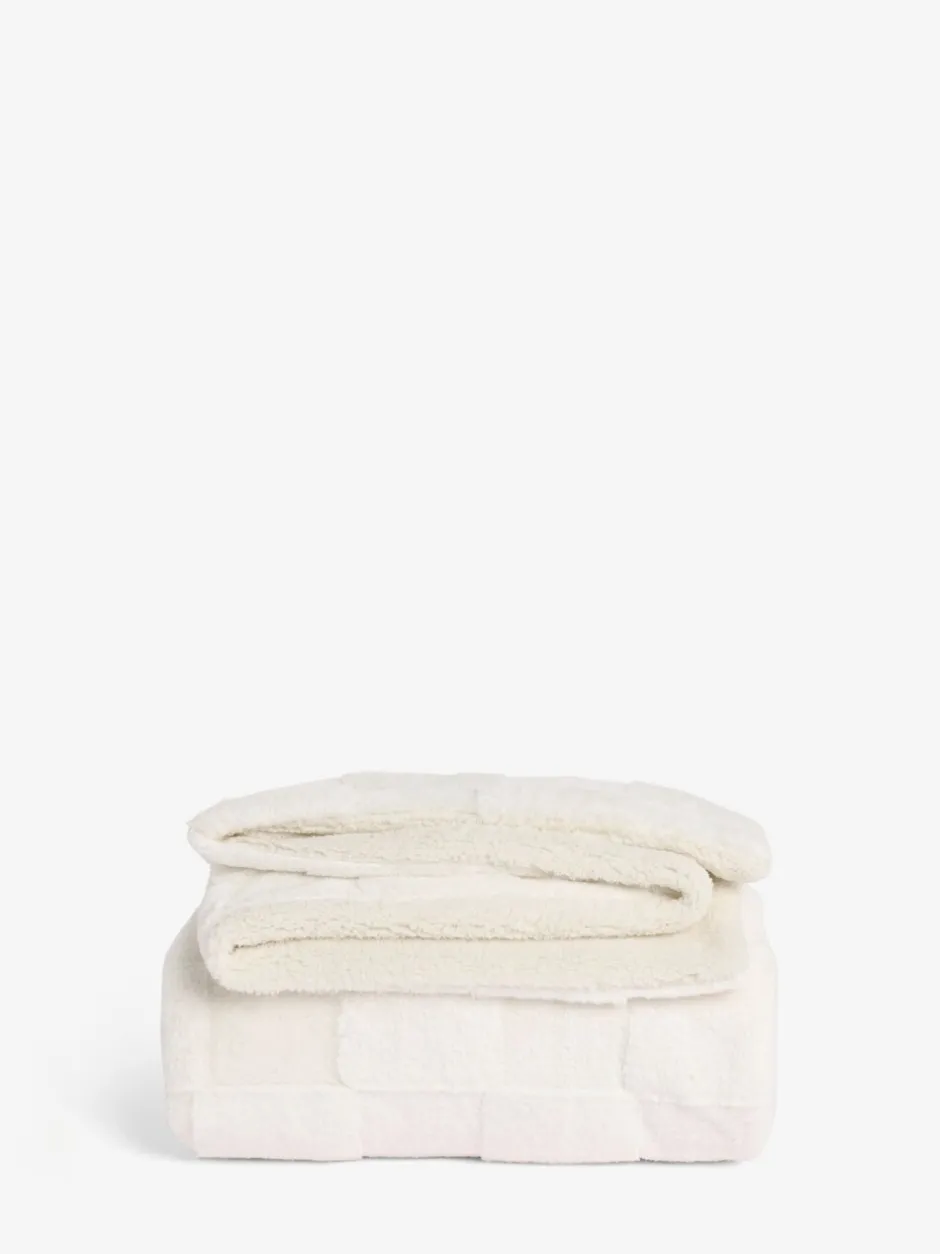 Kussentjes En Plaids|Kussentjes En Plaids|Next Jasper behaaglijke fleece omkeerbare bedloper met dambordmotief Ivoor