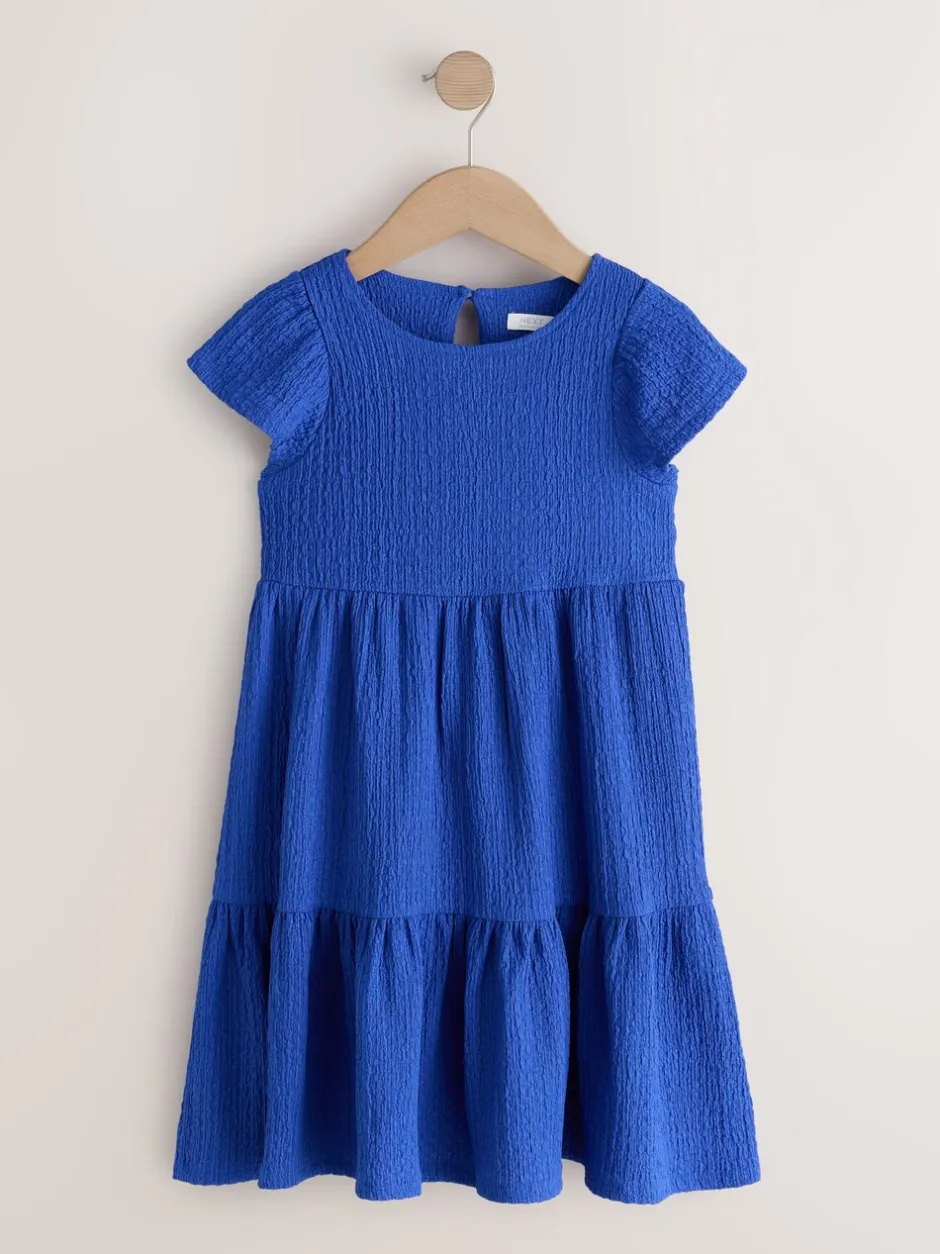 Jurken*Next - Angel Sleeve Crinkle Dress (3-16yrs) Kobaltblauw