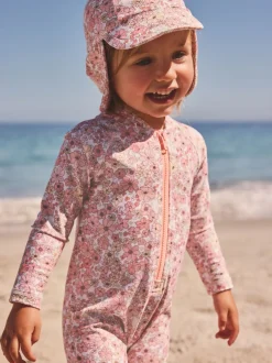 Badkleding*Next Koraalroze met fijne bloemenprint - Zonbeschermend badpak met lange pijpen (3 mnd-7 jr)