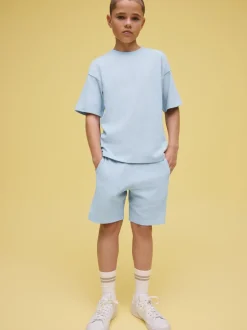Shorts*Next - Set van T-shirt met textuur en korte mouwen en shorts (3 - 16 jr) Lichtblauw