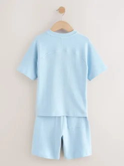 Shorts*Next - Set van T-shirt met textuur en korte mouwen en shorts (3 - 16 jr) Lichtblauw