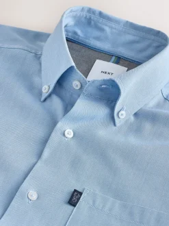 Formele Overhemden|Next Lichtblauw - Slim Fit - Gemakkelijk te strijken Oxford overhemd met doorlopende knopen