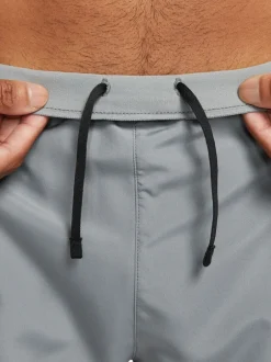 Shorts*Nike Lichtgrijs - Dri-FIT Challenger 5 Inch hardloopshorts met slipvoering