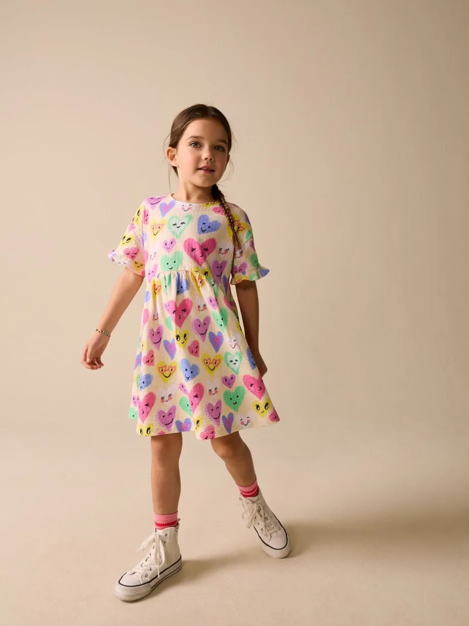 Jurken|Next - Jersey jurk met korte mouwen (3-16 jr) Light Yellow Heart Print