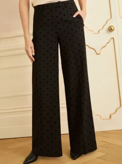 Kostuums En Werkkleding|Love & Roses broek met wijde pijpen en flockprint