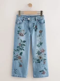 Jeans*Next Medium blauwe denim met bloemenprint - Jeans met wijde pijpen (3-16 jr)