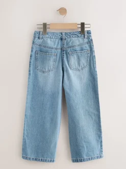 Jeans*Next Medium blauwe denim met bloemenprint - Jeans met wijde pijpen (3-16 jr)