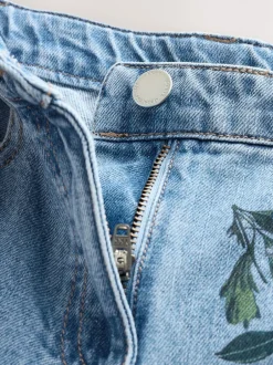 Jeans*Next Medium blauwe denim met bloemenprint - Jeans met wijde pijpen (3-16 jr)