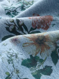 Jeans*Next Medium blauwe denim met bloemenprint - Jeans met wijde pijpen (3-16 jr)