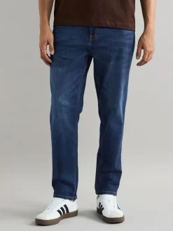 Jeans|Next Mediumblauw - Klassieke stretchjeans met standaard taps toelopende pasvorm
