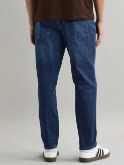 Jeans|Next Mediumblauw - Klassieke stretchjeans met standaard taps toelopende pasvorm