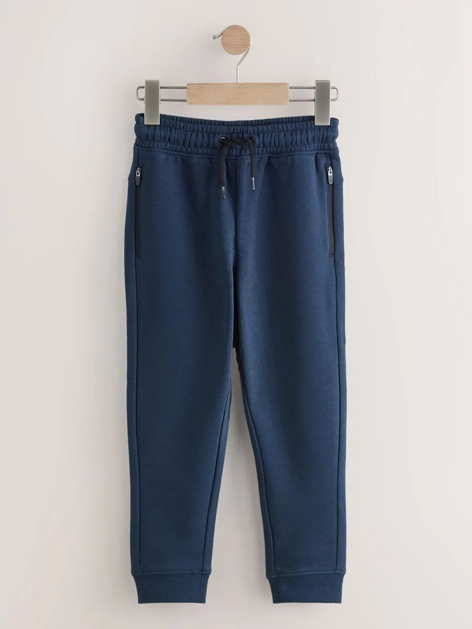 Joggingbroeken*Next - Verpakking van 3 slim fit joggingbroeken met (3-16jaar) Meerkleurig Zwart/Marine/Mineraal