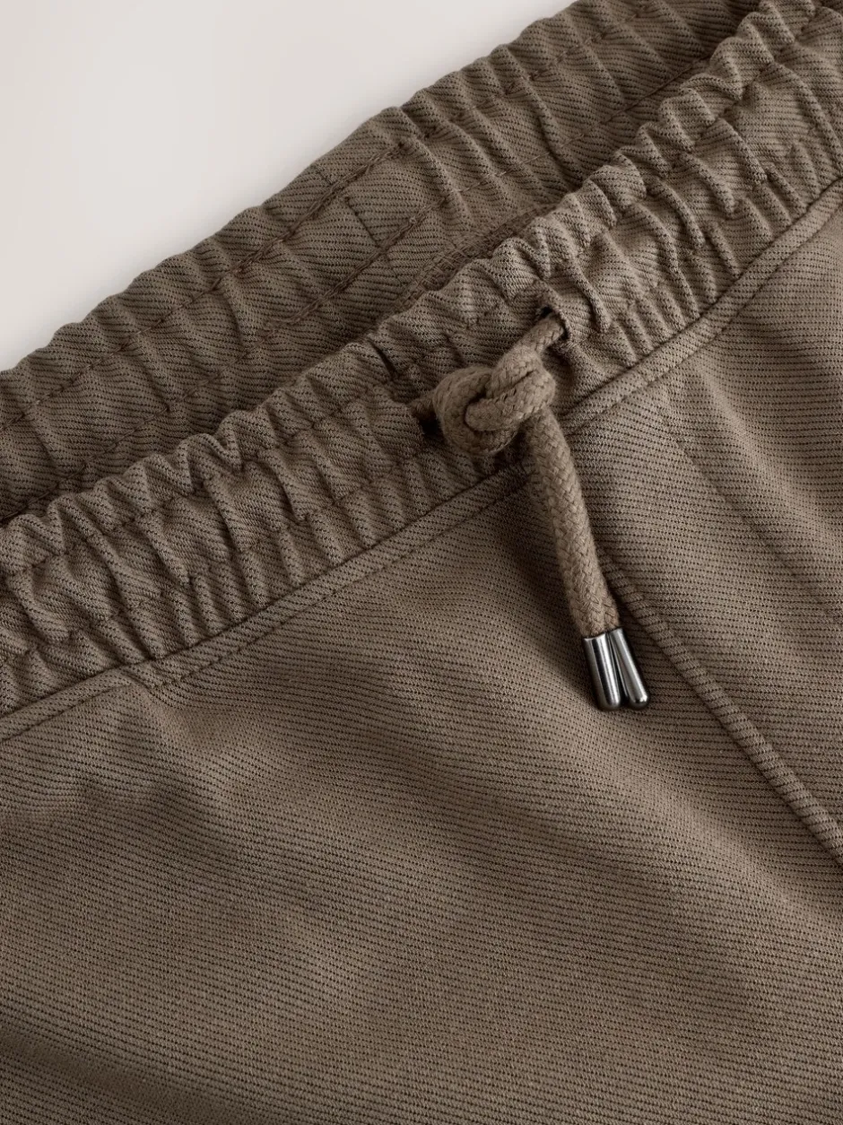 Joggingbroeken*Next - Joggingbroek van keperstof met rechte pijpen en textuur Naturel bruin