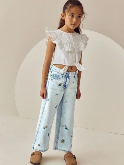 Jeans*Next Normaal blauw - Jeans met rechte pijpen en bloemenborduursel (3-16jr)