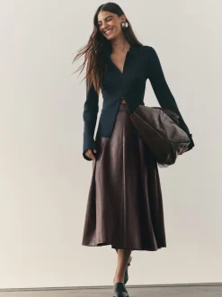Rokken|Nothing Ordinary Faux Leather Wrap Midi Kilt Skirt