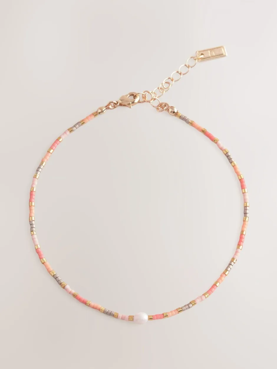 Sieraden*Next Oranje - Enkelbandje met kralen