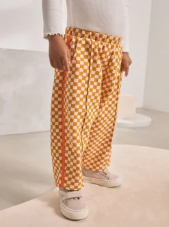 Broeken En Leggings*Next Oranje met dambordmotief - Broek met wijde kortere pijpen (3mnd -7jr)
