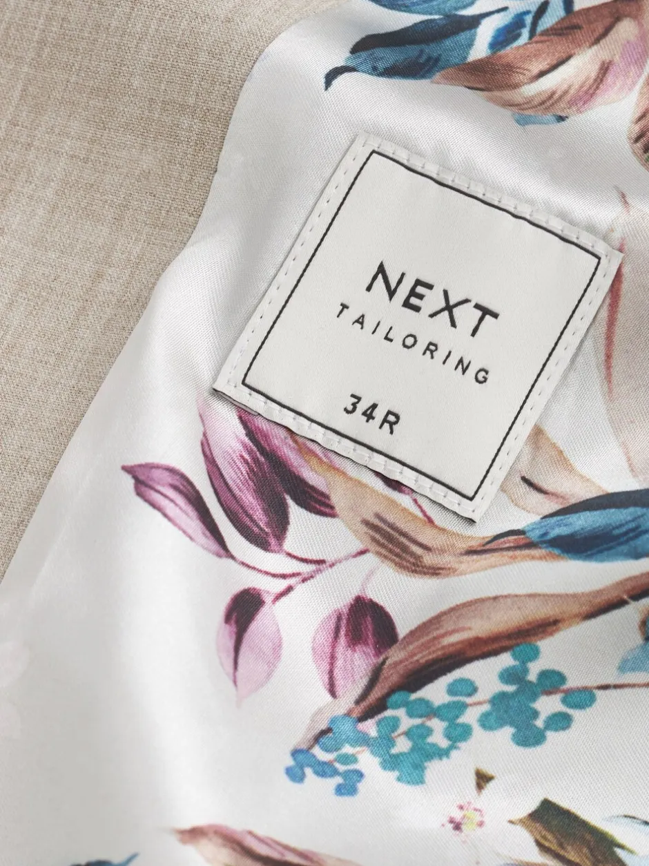 Vesten|Next Pastelgeel - Meegevend stretch-herenvest met standaard pasvorm