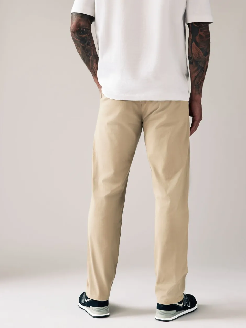 Broeken En Chino's*Next Pastelgeel - Straight fit - Stretchy chino