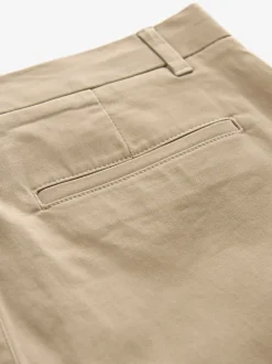 Broeken En Chino's|Next Pastelgeel - Strakke Pasvorm - Stretchy chino