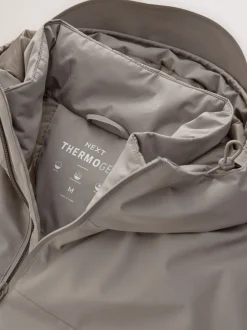 Jassen En Jacks*Next - ThermoGen Regenbestendig gewatteerd jack Pastelgeel