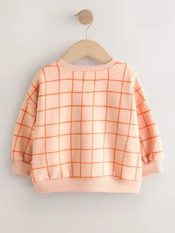 Truien En Breisels|Sweaters En Hoody´S*Next Perzikroze raster - Sweatshirt met ronde hals (3 mnd-7 jr)