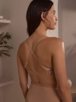 Beha's|Next - Nude beha voor een glad silhouet zonder bandjes met transparante achterkant Praline nude