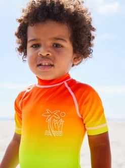 Badkleding|Badkleding|Next - Zonbeschermend onesie (3 mnd-7 jr) Regenboog dip-dye