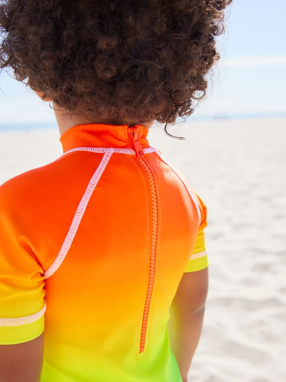Badkleding|Badkleding|Next - Zonbeschermend onesie (3 mnd-7 jr) Regenboog dip-dye