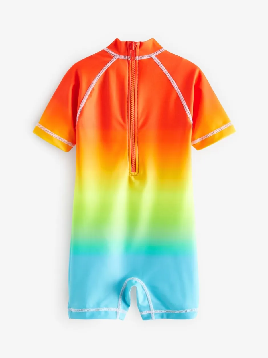 Badkleding|Badkleding|Next - Zonbeschermend onesie (3 mnd-7 jr) Regenboog dip-dye