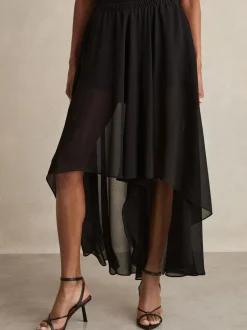 Shorts|Reiss Lucie doorschijnende high-low short met bovenlaag