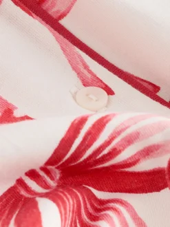 Nachtkleding En Pyjama's|Pyjama's|Next - Pyjama met knoopsluiting (3-16jr) Rode/witte strik print