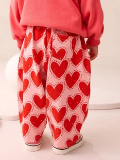 Broeken En Leggings|Next Rood met hartjesprint - Broek met structuur en wijde kortere pijpen (3mnd -7jr)