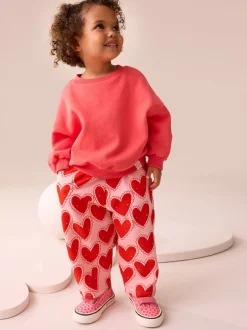 Broeken En Leggings|Next Rood met hartjesprint - Broek met structuur en wijde kortere pijpen (3mnd -7jr)