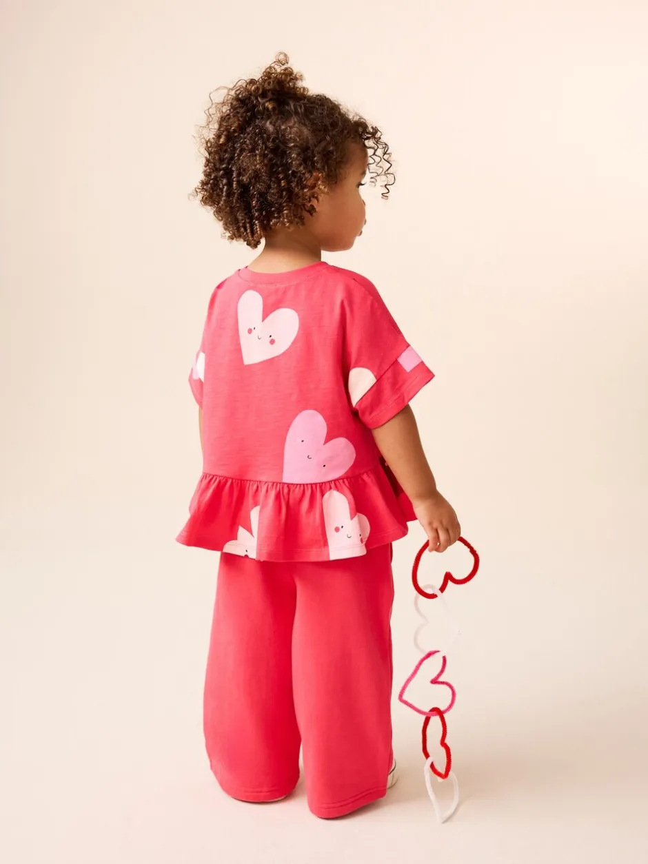 Tops|T-Shirts|Next Rood met hartjesprint - T-shirt met peplum en korte mouwen (3mnd -7jr)