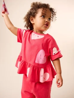 Tops|T-Shirts|Next Rood met hartjesprint - T-shirt met peplum en korte mouwen (3mnd -7jr)