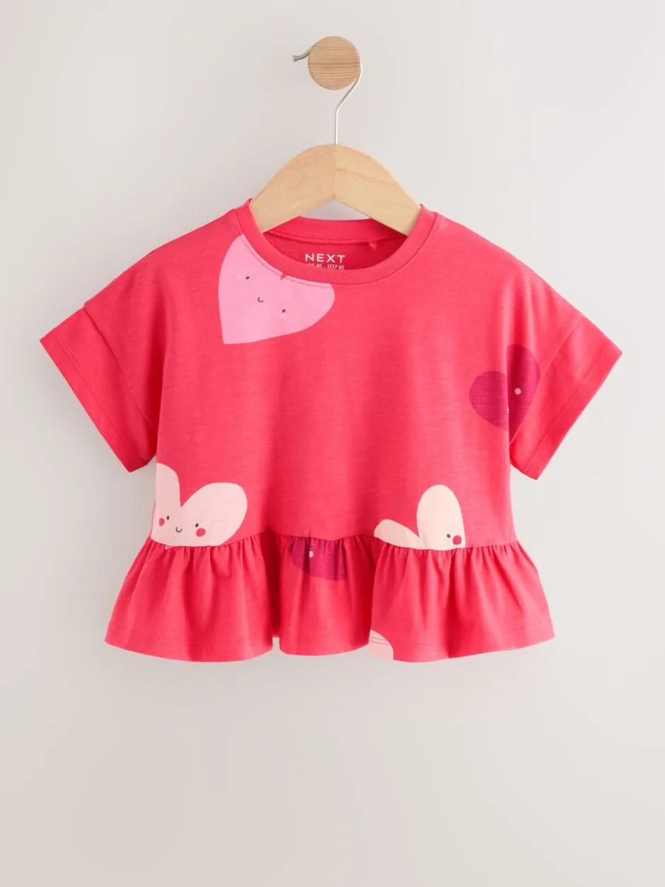 Tops|T-Shirts|Next Rood met hartjesprint - T-shirt met peplum en korte mouwen (3mnd -7jr)