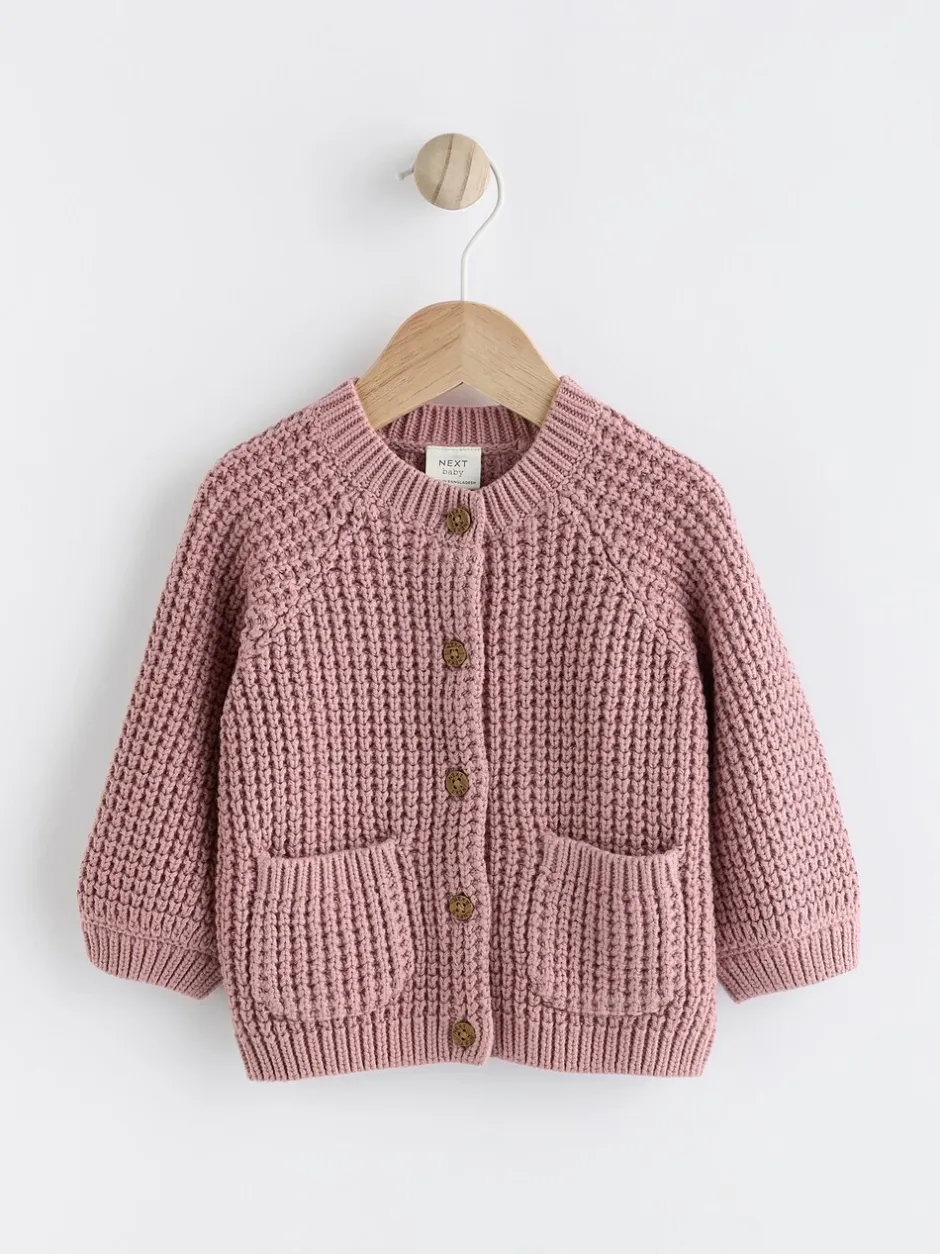 Gebreide Kleding|Next Roze - Gebreid babyvestje met geborduurde slogan op de rug (0mnd-2jr)